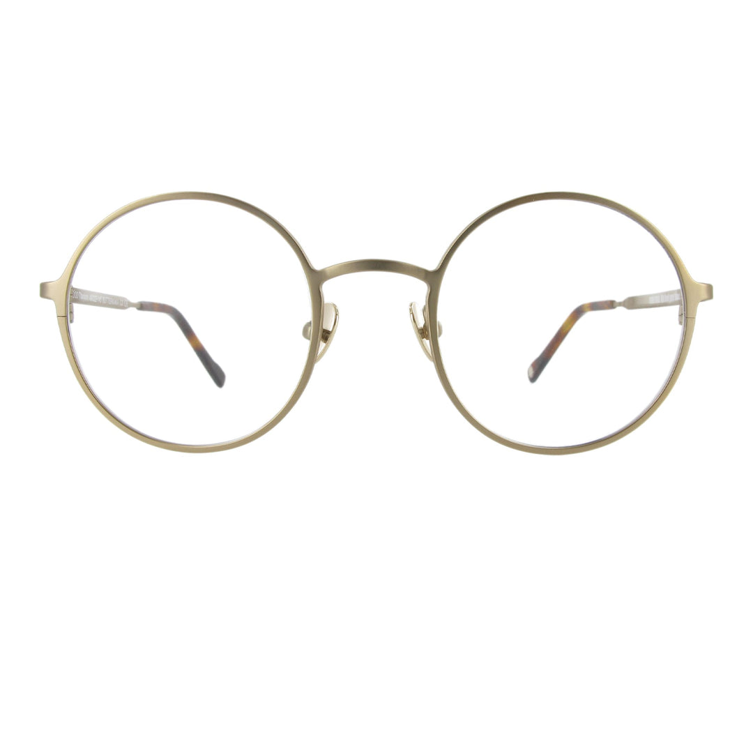 Edelstahlbrille in champagner Farbe mit runden Gläsern und großzügigem Steg, ausgewogen und minimalistisch.