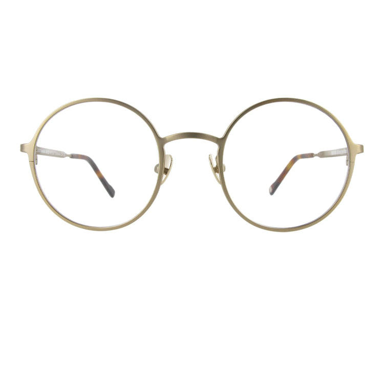 Edelstahlbrille in champagner Farbe mit runden Gläsern und großzügigem Steg, ausgewogen und minimalistisch.