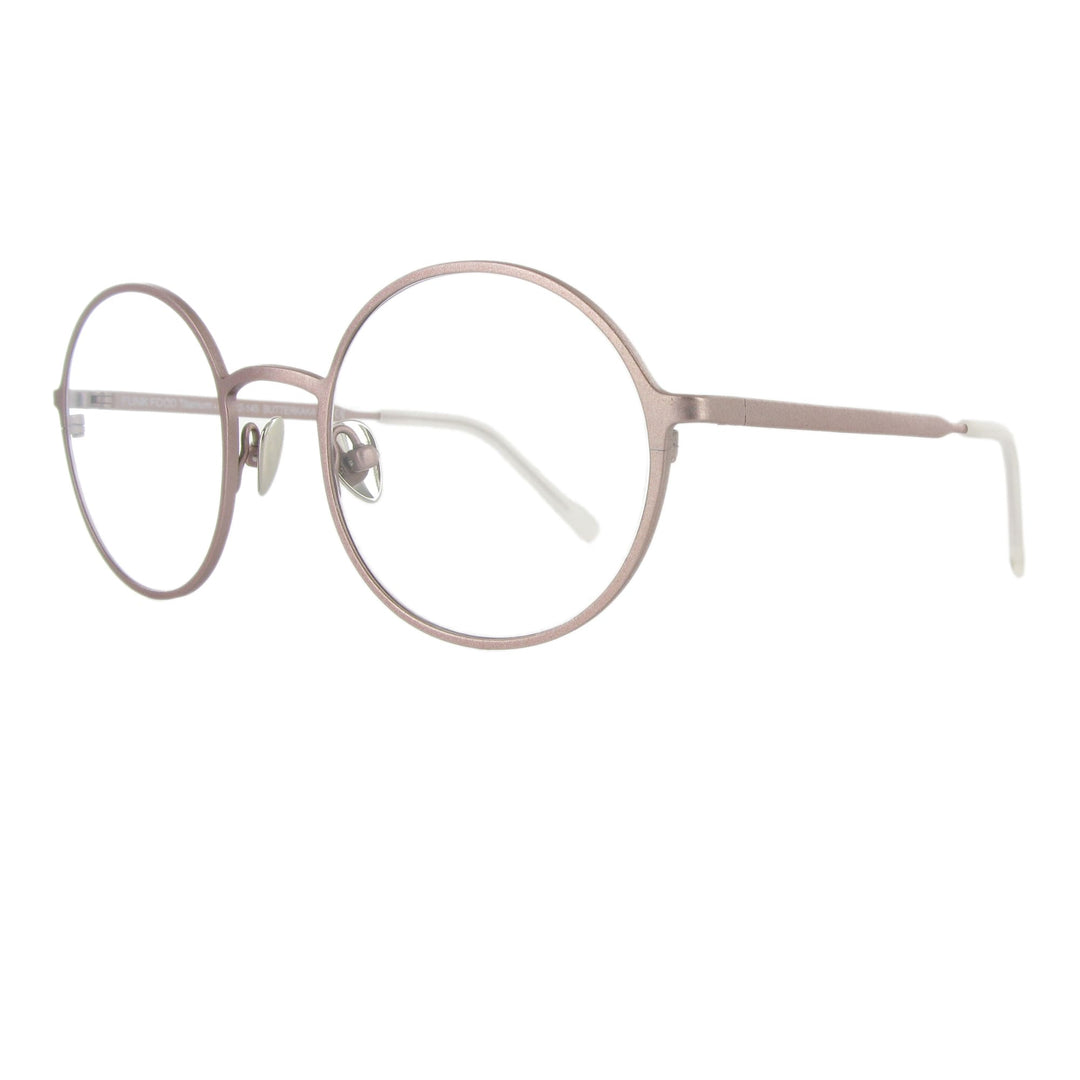 Edelstahlbrille in der Farbe pearl rose mit runden Gläsern und großzügigem Steg, ausgewogen und minimalistisch.
